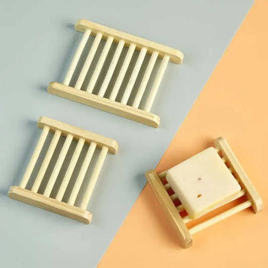 blonde bamboo soap trays keep your soap dry between uses. vital to the longevity of your soap.