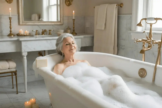 Syrena - Pure Traditional Plain tallow soap being used by a beautiful elderly woman soaking in a bubble bath