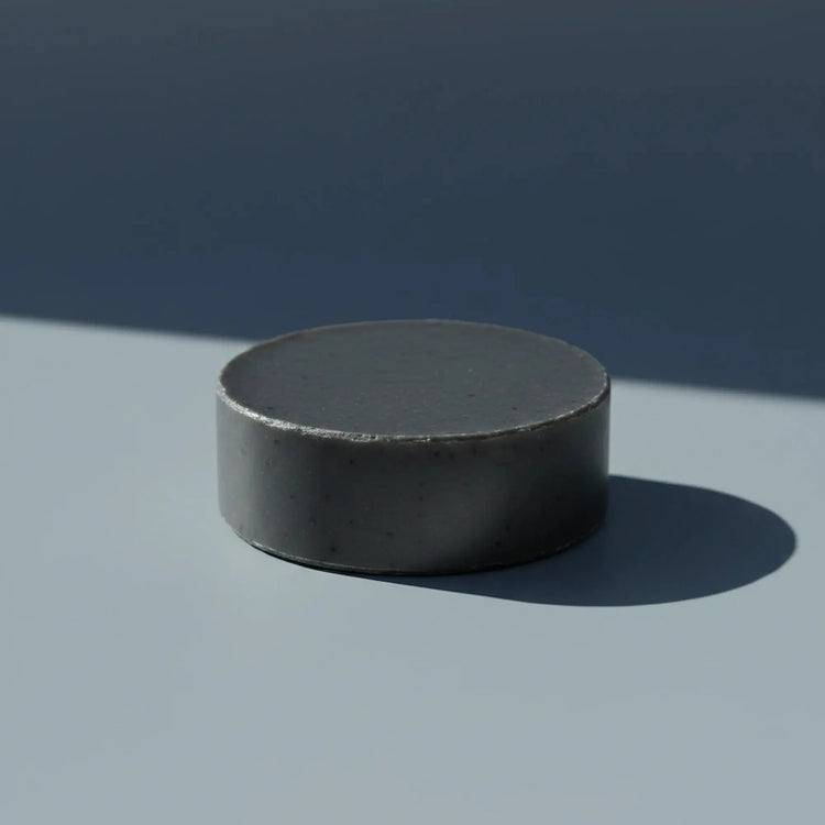 Salt & Timber | Grass Fed Tallow | Shampoo Bar Blind Pirate Soap Co. Gun metal gray round puc shampoo bar.