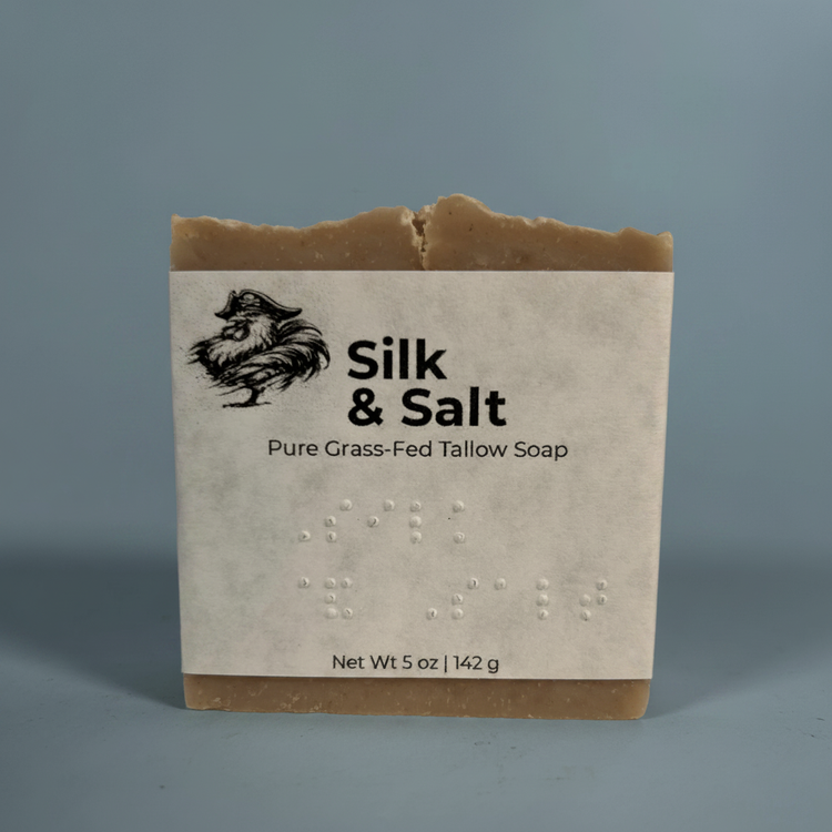 Silk & Salt — close up of the soap and the fully brailled label Silk & Salt