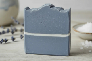 handmade artisan soap two toned with a white wave through the middle indigo blue called surfer suds