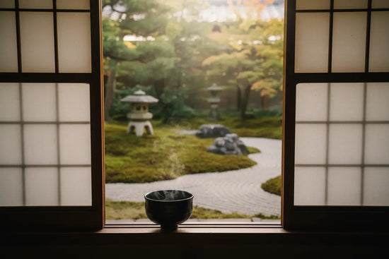 Japanese paper doors opening onto a serene Zen garden, stone path winding through soft morning light.