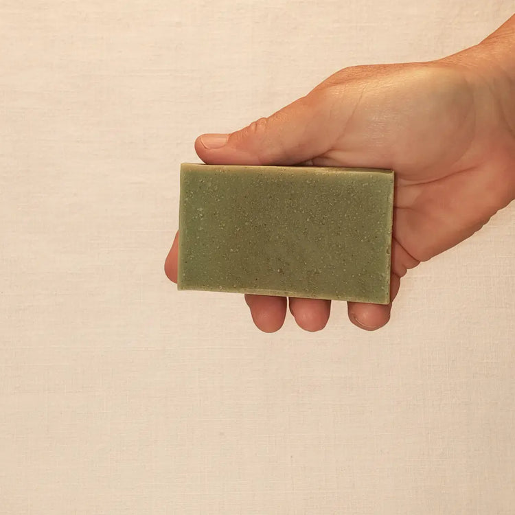 "Rustic cut Emerald Harbour grass-fed tallow soap bar, rich deep green with natural speckles. Blind Pirate Soap Co