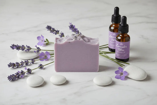 French Lavender - soap surrounded by fresh lavender stems, essential oil and white stones