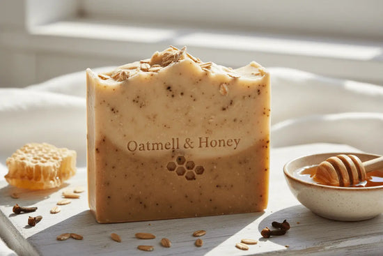 handmade artisan soap made with colloidal oatmeal coconut milk and organic oils with clove and is called OATMEAL & HONEY