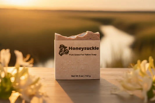 Blind Pirate Soap Co. Honeysuckle bar, front label, warm Lowcountry marsh light at golden hour

