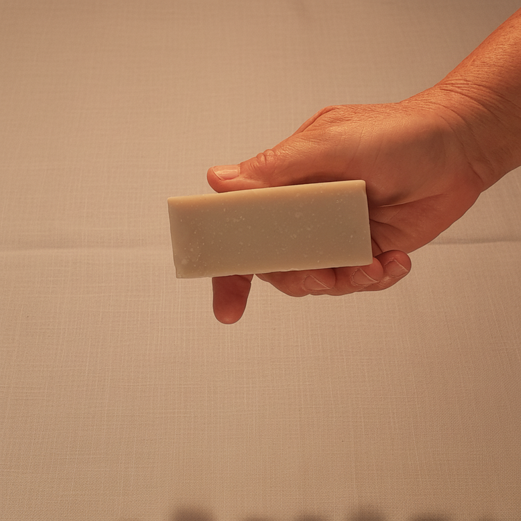 Rustic cut Oatmeal & Honey grass-fed tallow soap bar, warm cream with oat speckles. Blind Pirate Soap Co.