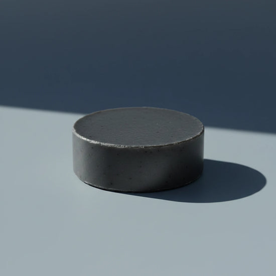 Salt & Timber | Grass Fed Tallow | Shampoo Bar Blind Pirate Soap Co. Gun metal gray round puc shampoo bar.