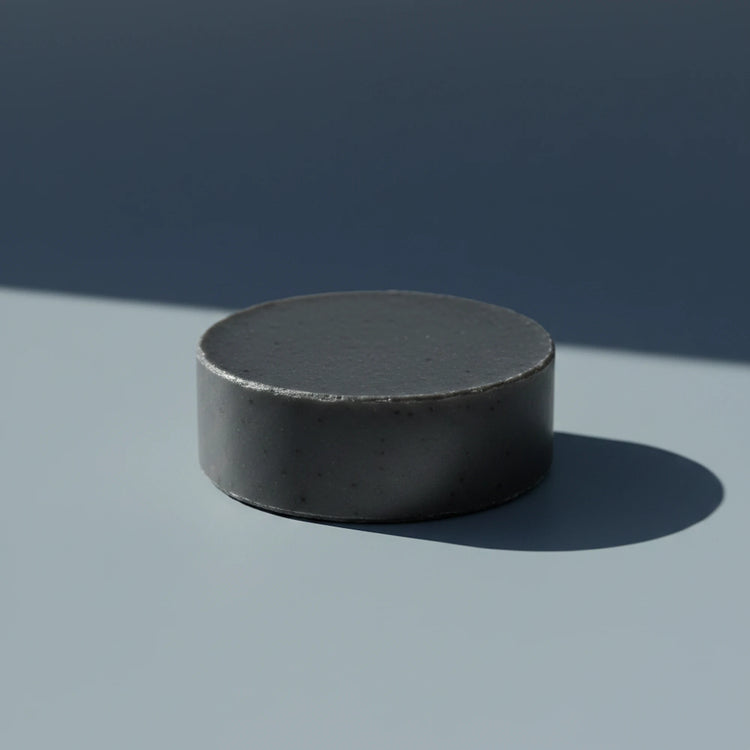 Salt & Timber | Grass Fed Tallow | Shampoo Bar Blind Pirate Soap Co. Gun metal gray round puc shampoo bar.