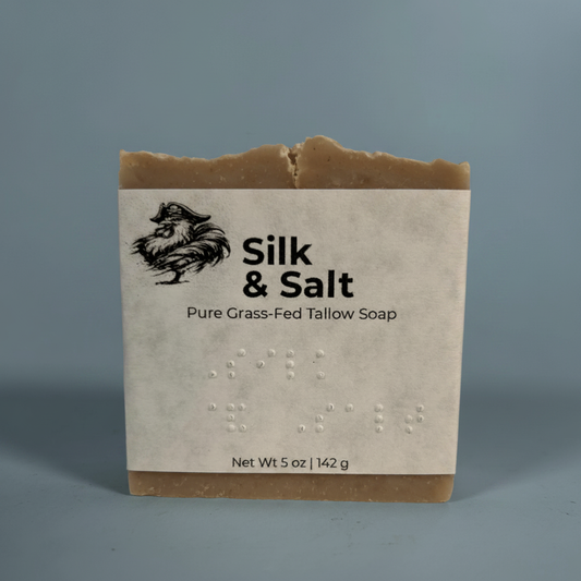 Silk & Salt — close up of the soap and the fully brailled label Silk & Salt